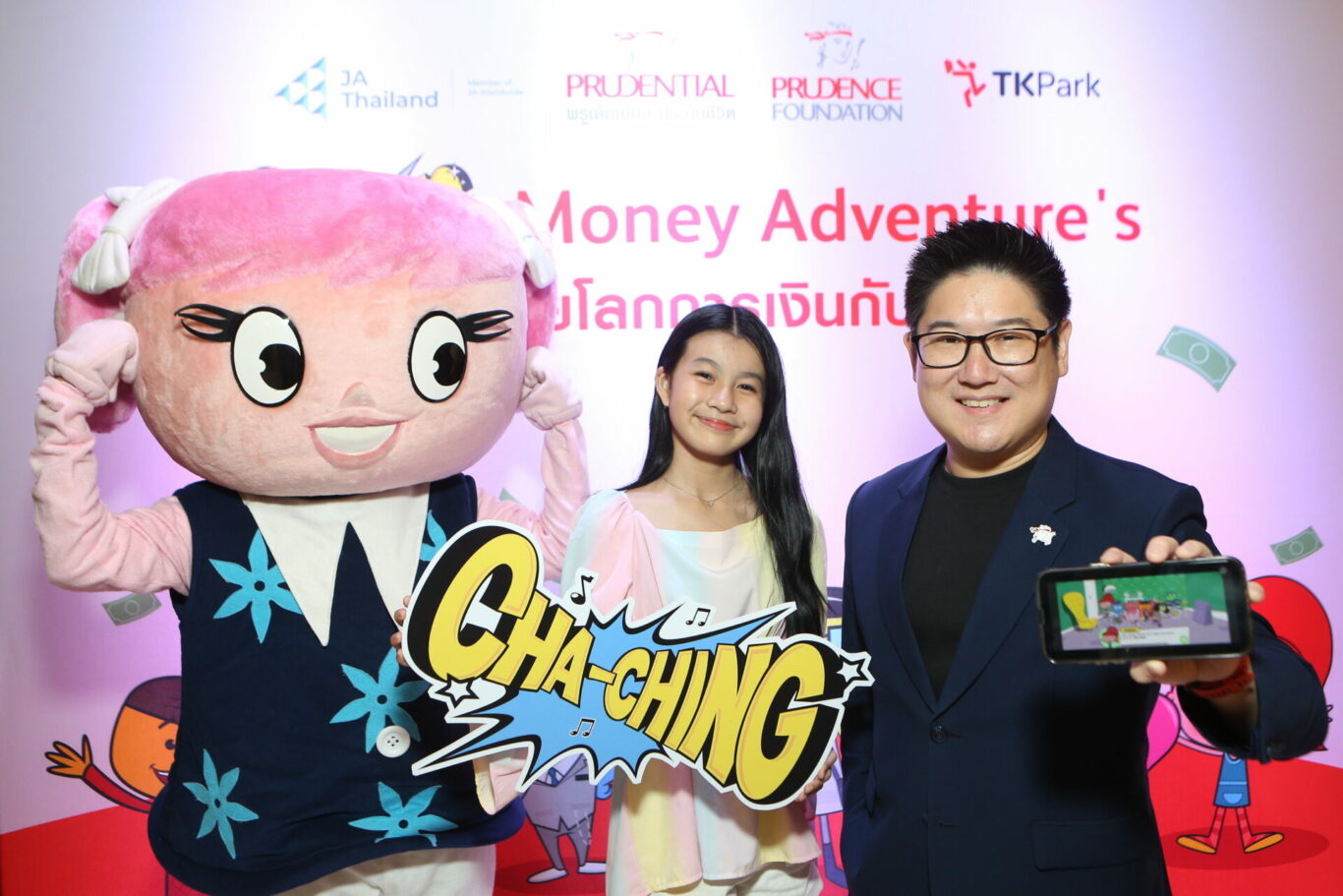 A person and person posing with a mascot

Description automatically generated