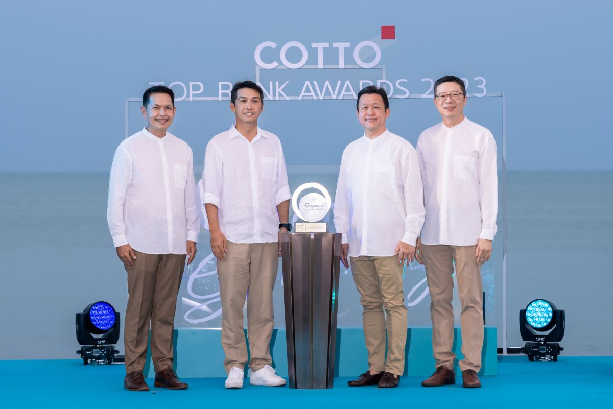 A group of men standing in front of a podium

Description automatically generated